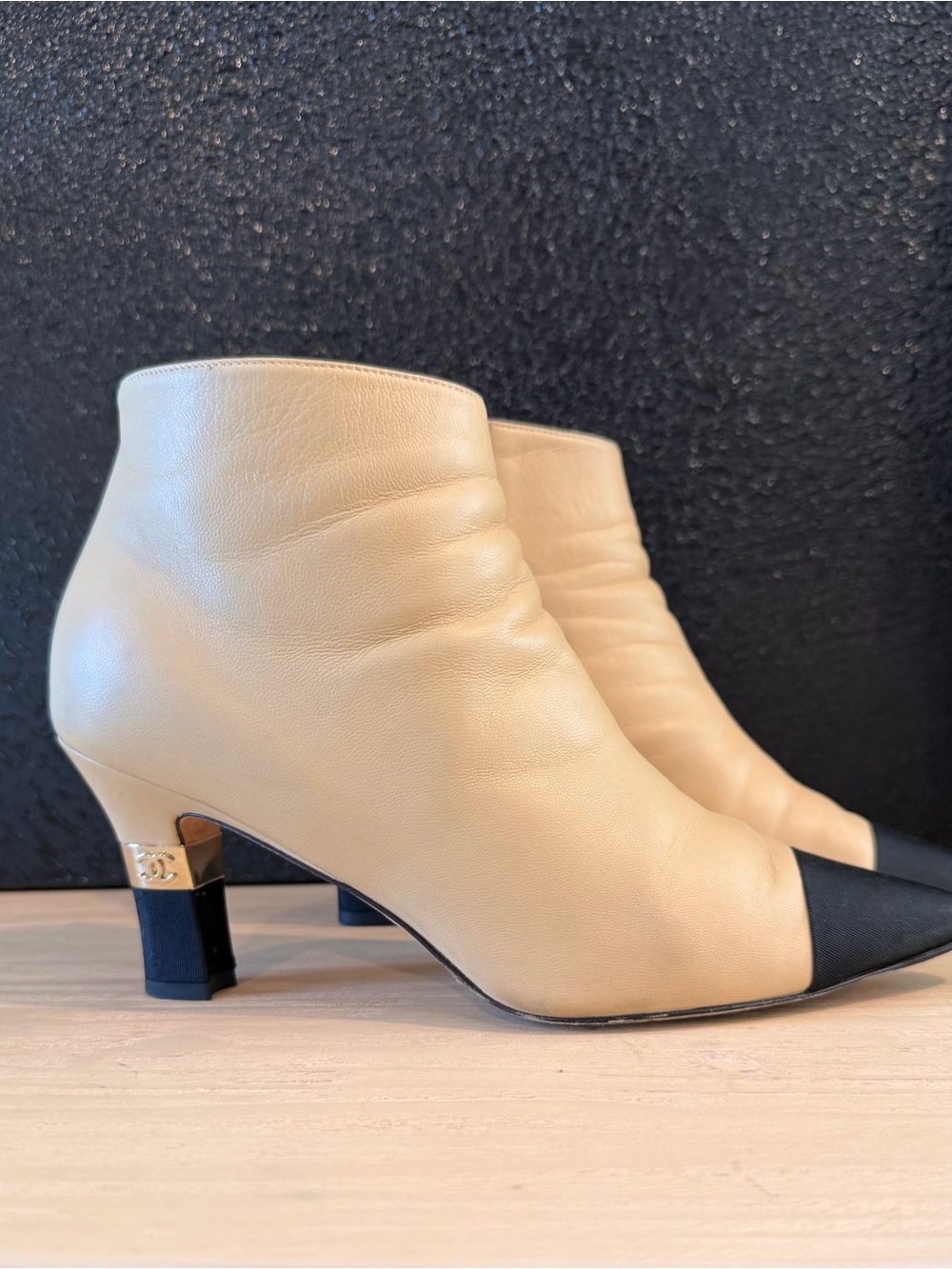 CHANEL Beige Leather Ankle Boots with Black Cap Toe